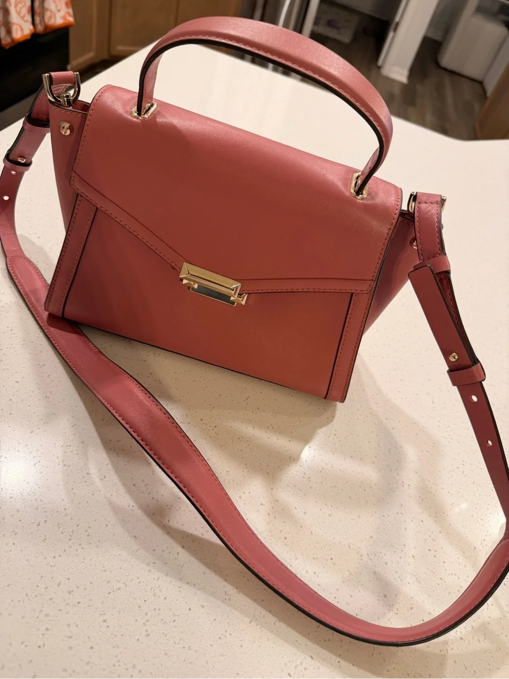 Michael Kors Whitney leather satchel in the rose/dusty-pink color